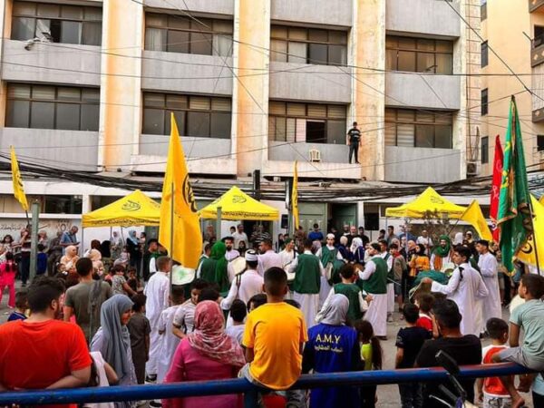 إحياء ذكرى المولد النبوي في مخيم البداوي، حيث تضمن العديد من الفعاليات وتوزيع الحلوى على المارة