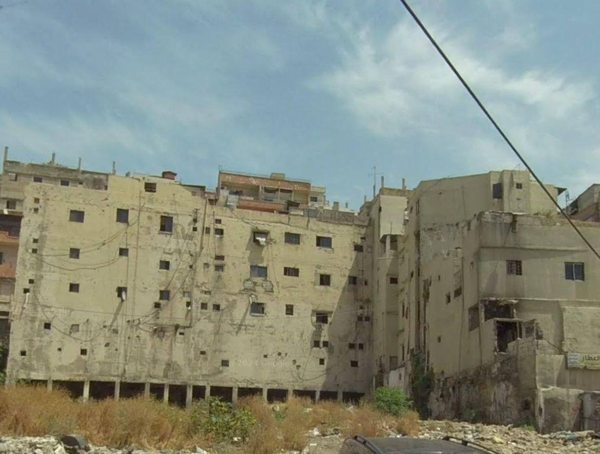 المبنى المنهار في منطقة التبانة مؤلف من 12 شقة